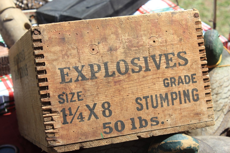 a wooden box of stumping explosives to illustrate dynamiting self-deception